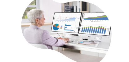 woman with white hair looking at monitor with graph images signals clinical brochure - new cover image